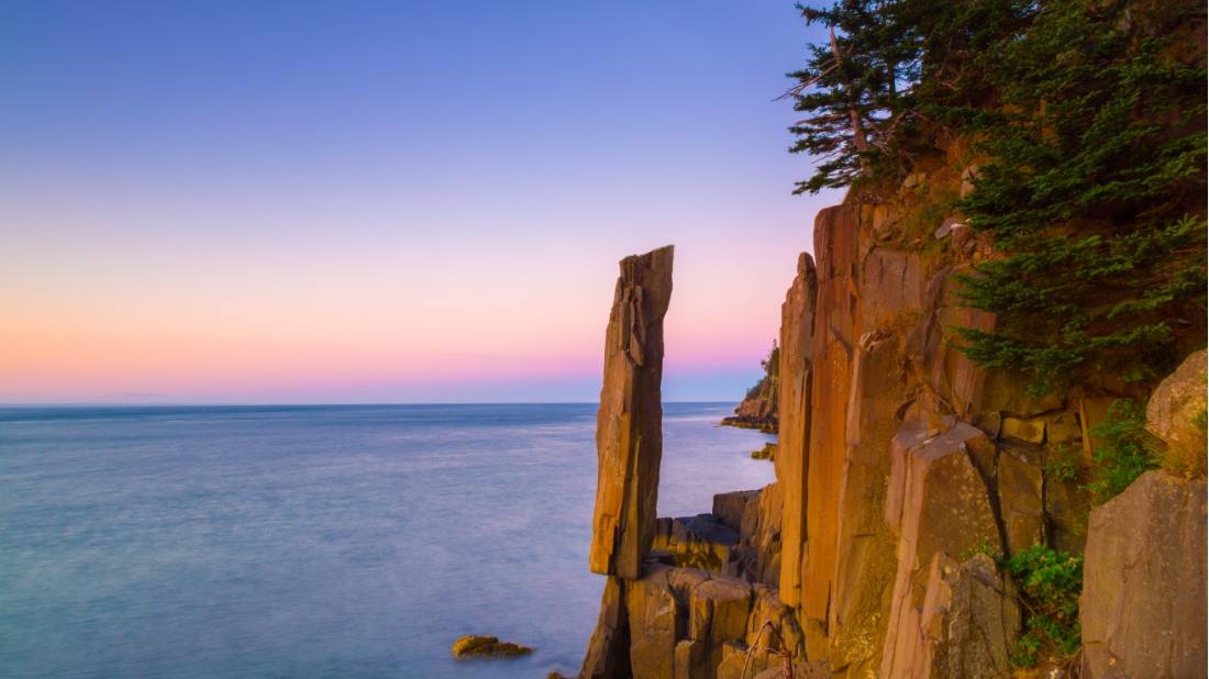 The Balancing Rock and a beautiful sunset | <i>Tourism Nova Scotia</i>