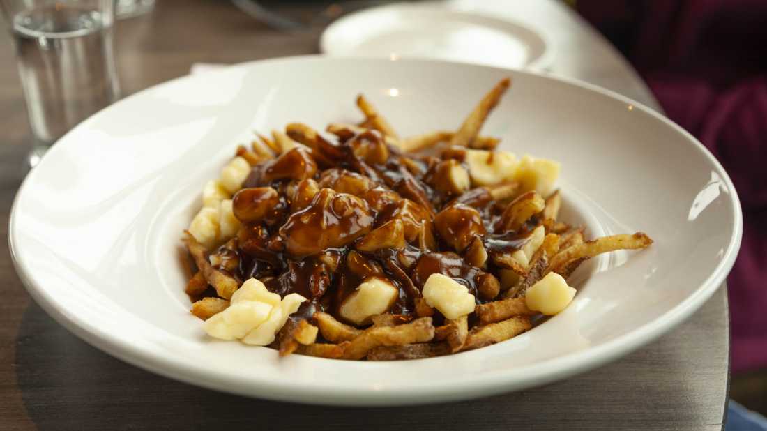 You can't visit Quebec without tasting a poutine | André Quenneville
